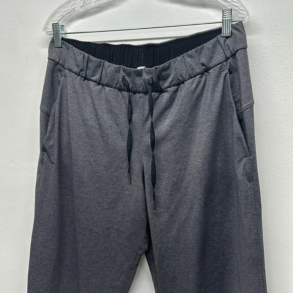 Lululemon On The Fly Pant Luxtreme Pants 27" Heathered Black W5BSES Size 10 - Picture 3 of 11